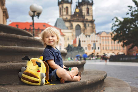 Cute child, boy, visiting Prague after the quarantine Covid 19, empty streetsの写真素材