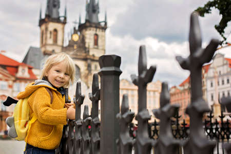 Cute child, boy, visiting Prague after the quarantine Covid 19, empty streetsの写真素材