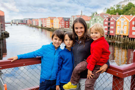 Happy family, visiting Trondheim, Norway during the summer, enjoying the cityの写真素材