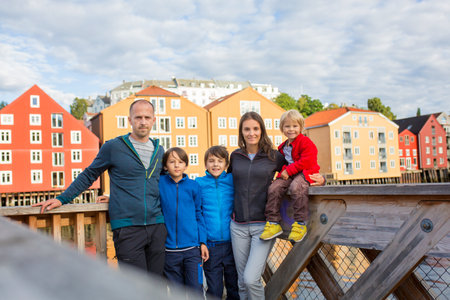 Happy family, visiting Trondheim, Norway during the summer, enjoying the cityの写真素材