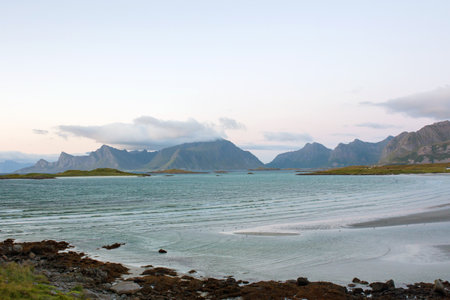 Scenic panorama view of norwegian beautiful nature and small fishing villages with typical rorbu wooden red cabins in Lofoten, northern Norwayの写真素材