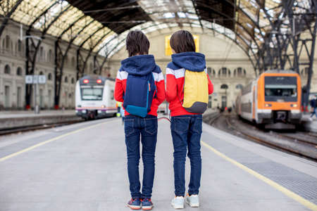 Cute little children tourists admiring Barcelona city, family travel with kids in Spainの写真素材