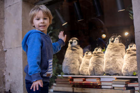 Cute little children tourists admiring Barcelona city, family travel with kids in Spainの写真素材