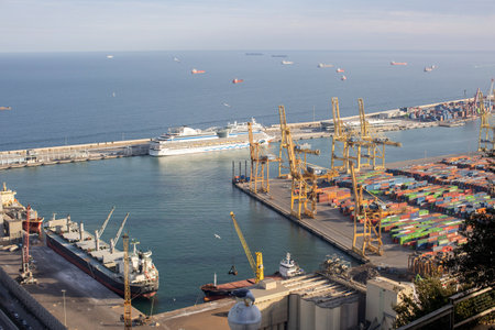 Port in Barcelona with lots of colorful containers, docks in Barcelona, Spain from the top of the mountain Montujic, from the castleのeditorial素材