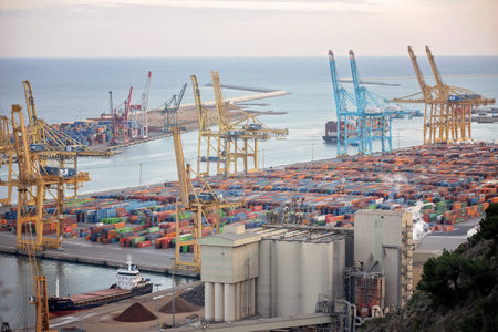 Port in Barcelona with lots of colorful containers, docks in Barcelona, Spain from the top of the mountain Montujic, from the castleのeditorial素材