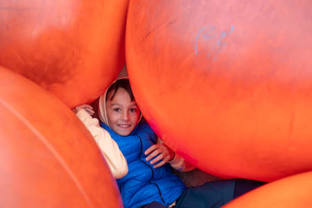 Happy family, children and adults, enjoying the colorful city of Stavangen in Southwest Norway on a...