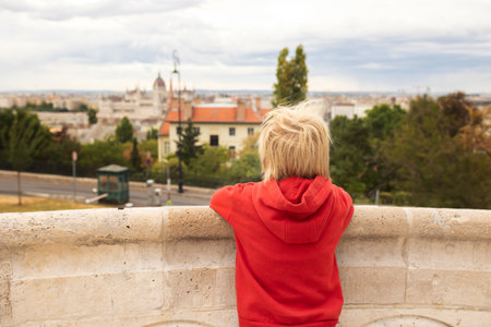 Child, boy, visiting the castle in Budapest on a summer day, Hungaryの写真素材