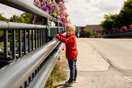 Beautiful town Kristiansand in Norway, family visiting Norway for summer vacation, kids enjoying amazing viewsの写真素材
