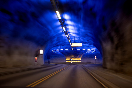Roundabout in a tunnel in Norway, lighted in blue, beautiful architecture styleの写真素材