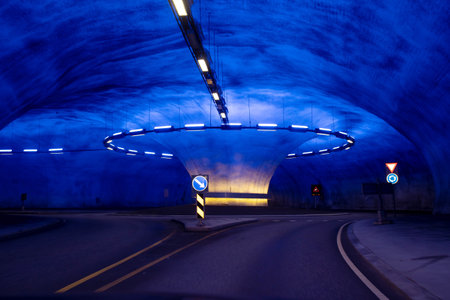 Roundabout in a tunnel in Norway, lighted in blue, beautiful architecture styleの写真素材