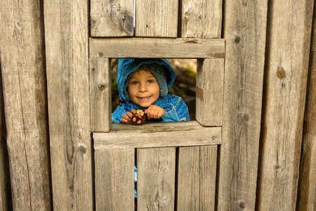 Family, kids, adults and dog, enjoying family vacation in Alesund, beautiful city in West Norwayの写真素材