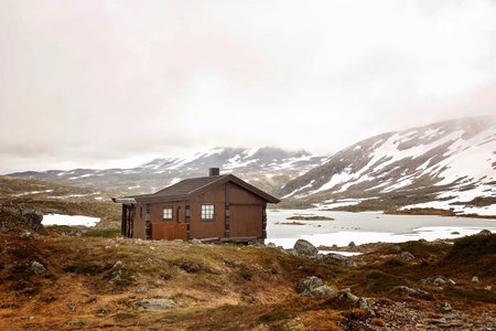 Fjord with snowy mountains in Norway, high in mountainsの写真素材