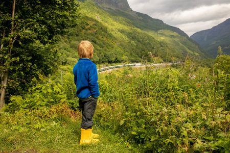 People, children enjoying the amazing views in Norway to fjords, mountains and other beautiful nature miraclesの写真素材