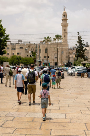 European tourist family with children, visiting Betlehem, learning about new cultures of the world