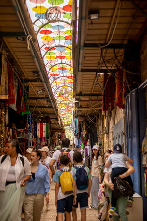 European tourist family with children, visiting Jerusalem, meeting new cultureの写真素材