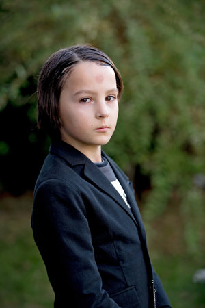 Child, dressed for Halloween, playing at home, isolated image outdoorsの写真素材
