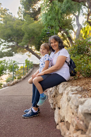 Grandmother and child in Monaco Monte Carlo, summertimeの写真素材