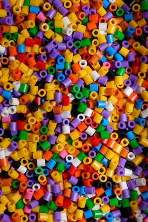 abstract background of close up multi colored beads