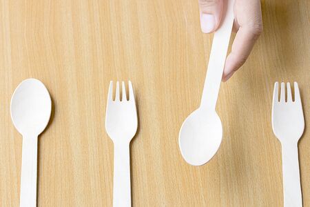 Woman hand holds a spoonの写真素材