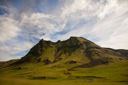 a beautiful mountain in Iceland, covered with grassの写真素材