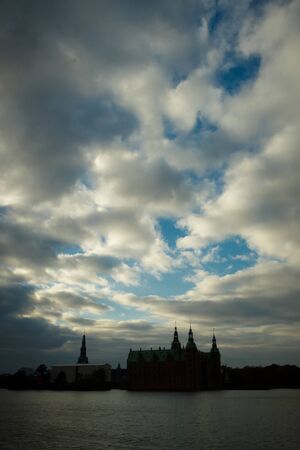 Frederiksborg slot in beautifull evening light in during autumnの写真素材