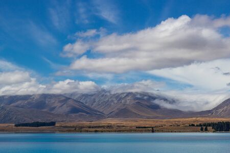 view of Tekapo lake on a sunny day, South island, New Zealandの写真素材