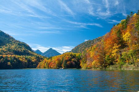 view of Alpsee lake in Bavaian Alps near Schwangau, Germanyの写真素材