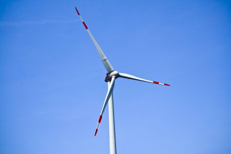 Rotor of a wind turbine and in the background the blue skyの写真素材