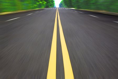 High speed driving car on the empty road の写真素材