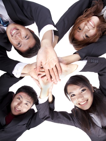 Asian Young Business people joining their handsの写真素材