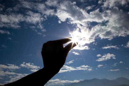 Sunlight like shine diamond, catched it by handの写真素材