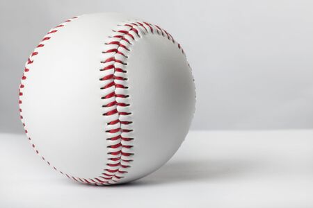 Baseball ball on the white tableの写真素材