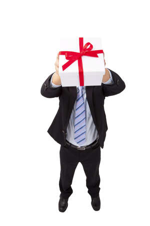 businessman holding a gift の写真素材