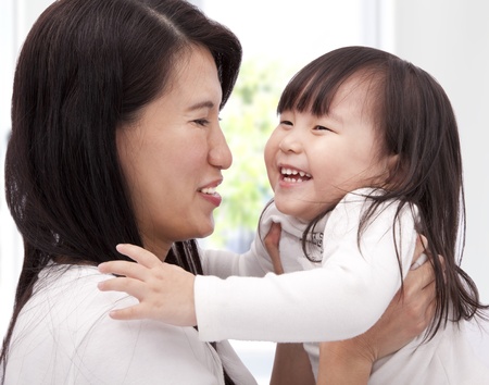 Close-up of asian little girl and  her mother の写真素材