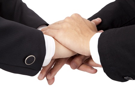 Trust and cooperation  concept. stacked hands of businessman