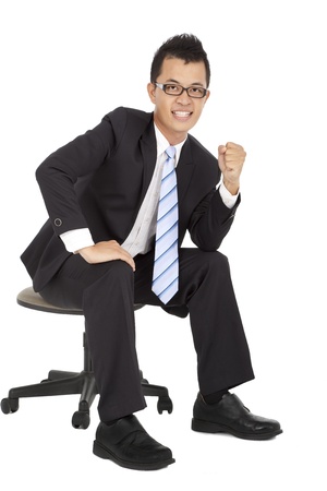asian young Businessman sitting on the chair and isolated on whiteの写真素材