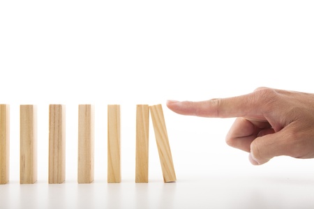 hand push down the wall conceptの写真素材