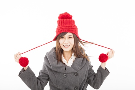  happy young woman wearing winter coat and capの写真素材