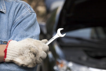 car technician holding the wrenchの写真素材