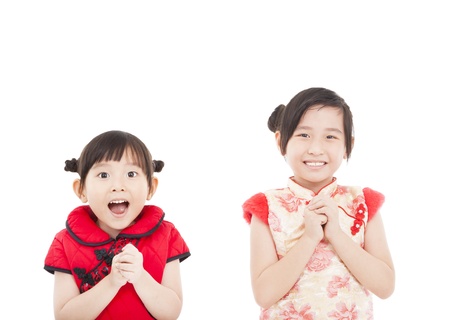 happy chinese new year. two asian girls with Congratulation gestureの写真素材