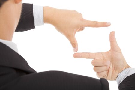 businessman making frame with handsの写真素材