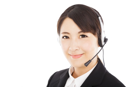 beautiful smiling businesswoman with headphoneの写真素材