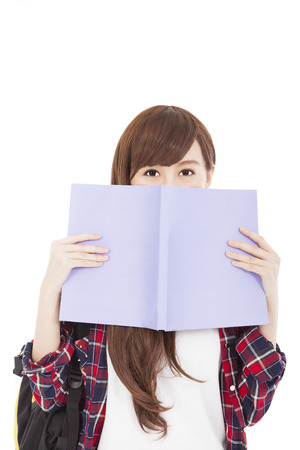 young student girl holding the bookの写真素材
