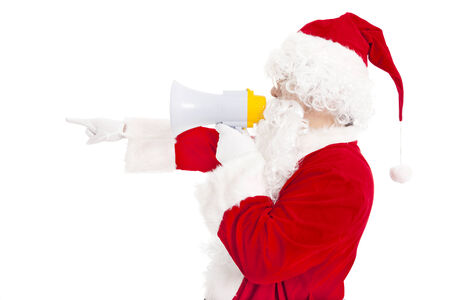 Santa Claus holding megaphone with pointingの写真素材