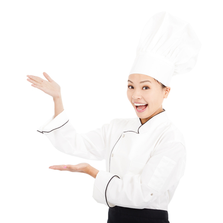 young graceful woman dressed as a cook with capの写真素材