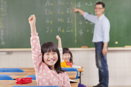 School children in classroom at lessonの写真素材