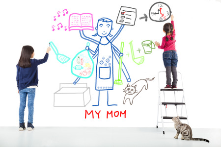 two kids drawing her mother working tasks