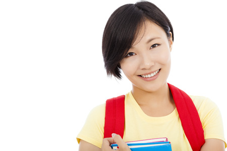 closeup of smiling student girl over white backgroundの写真素材