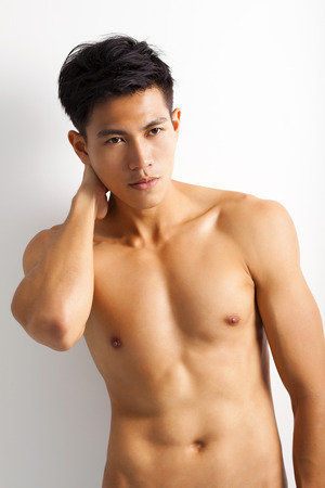 asian young sport man with perfect fitness bodyの写真素材