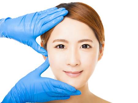 closeup young   woman face with medical beauty conceptの写真素材